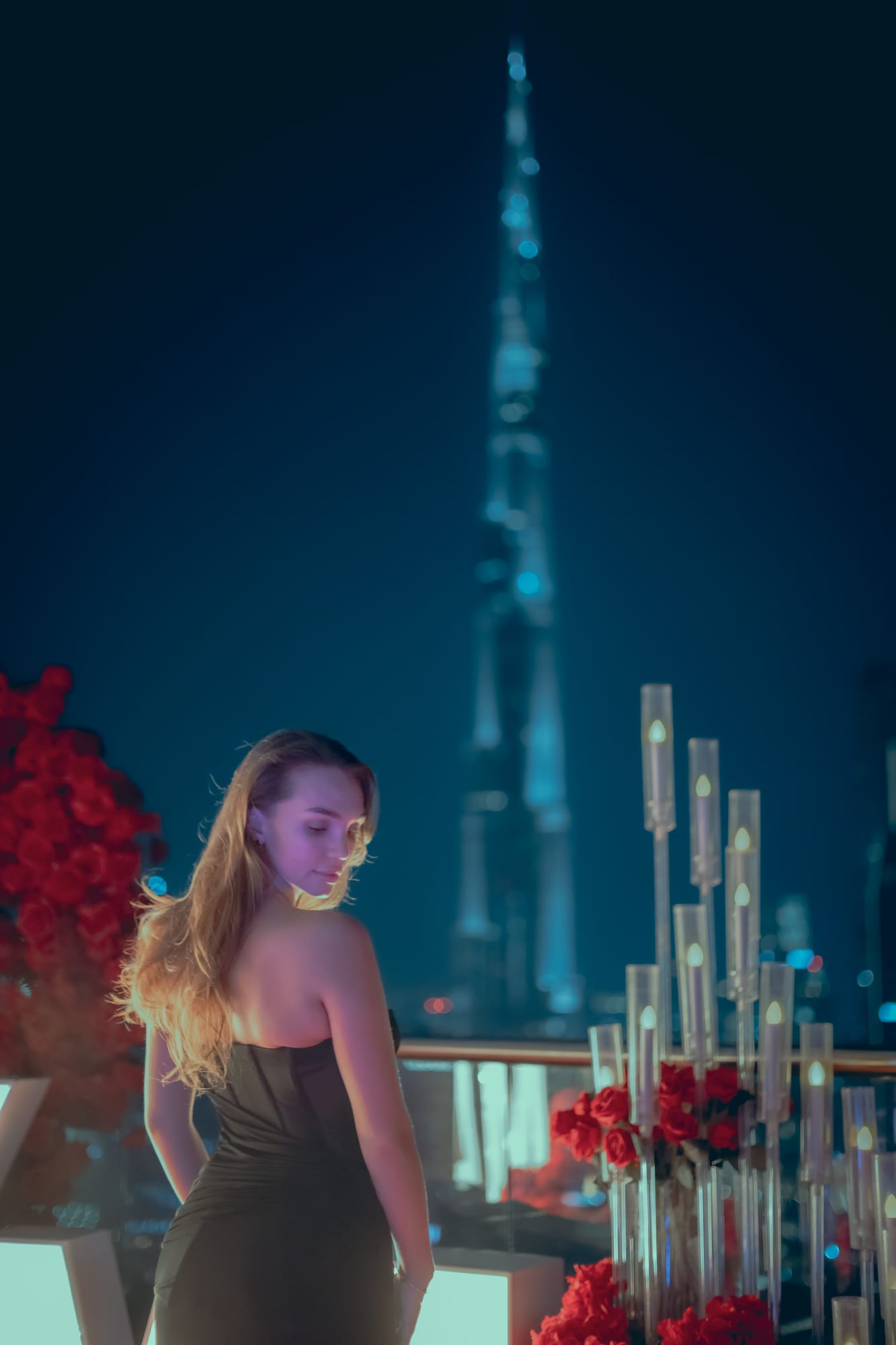 Skyline evening with candles and red roses