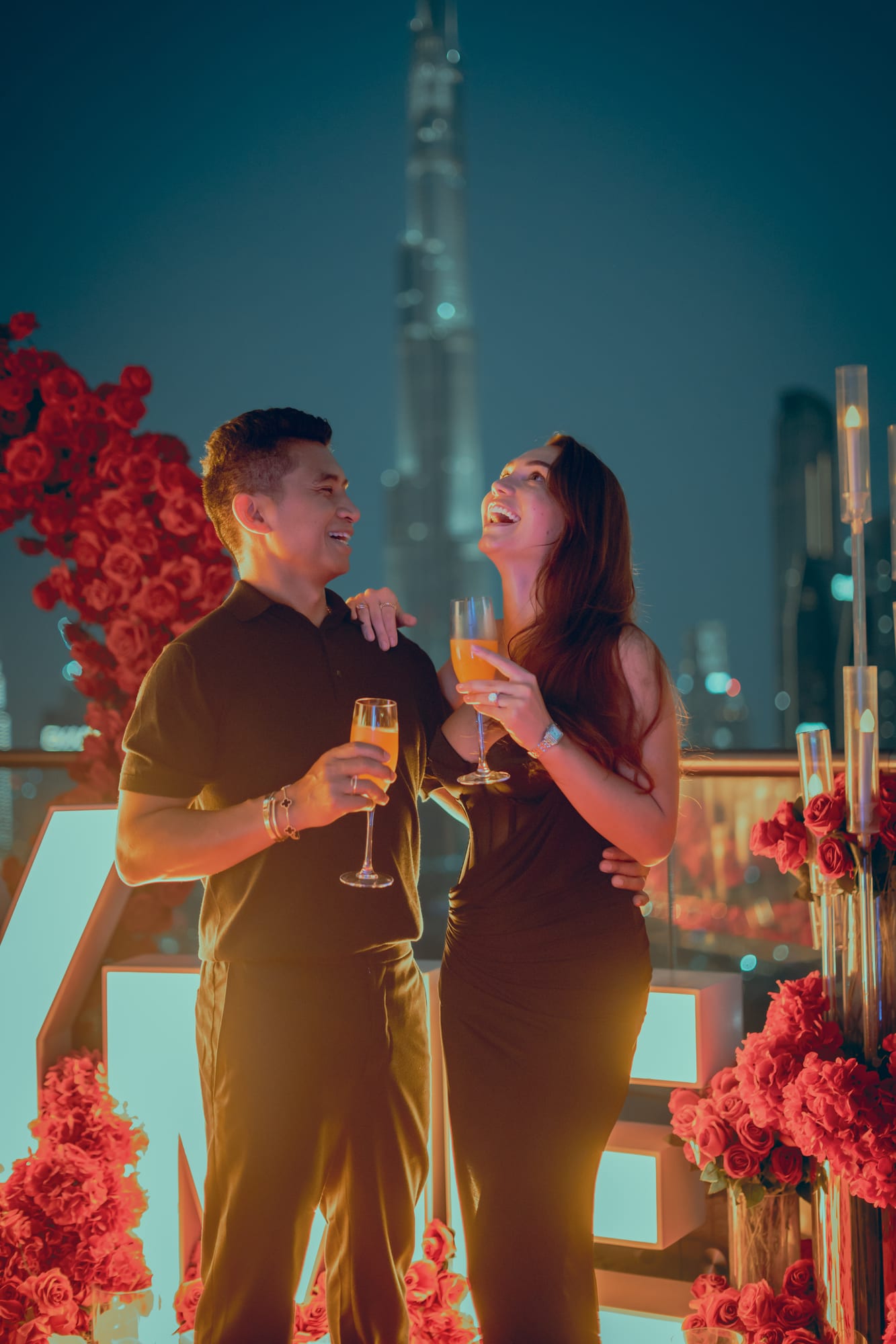 Champagne toast beside the rose installation