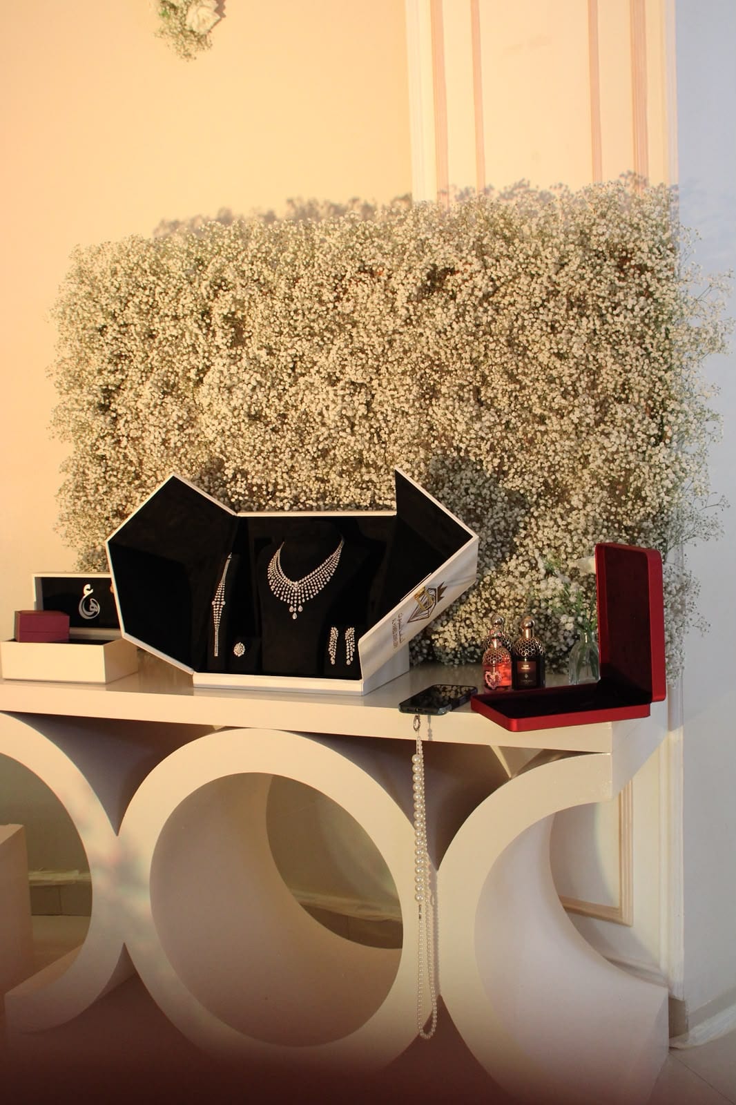 Jewelry display set against baby's breath